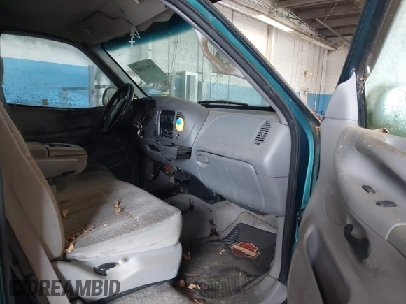 1998 Ford F-150 z VIN 1FTZX18W0WNB10429, wystawiony jako IAAI lot #42501385 z przebiegiem 175 318 mil mil oraz . Historia ofert i sprzedaży dostępna na DreamBid. Obrazek 5.