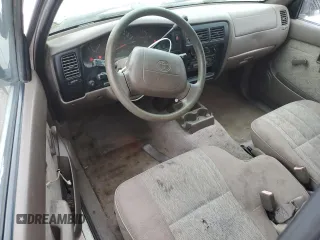 1999 Toyota Tacoma z VIN 4TAVL52N6XZ555376, wystawiony jako Copart lot #85763154 z przebiegiem 229 914 mil mil oraz Nie do naprawy • Non repairable. Historia ofert i sprzedaży dostępna na DreamBid. Obrazek 8.