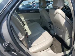 2016 Lincoln MKZ z VIN 3LN6L2J99GR620863, wystawiony jako Copart lot #59547725 z przebiegiem 121 607 mil mil oraz Szkoda całkowita • Salvage title. Historia ofert i sprzedaży dostępna na DreamBid. Obrazek 10.