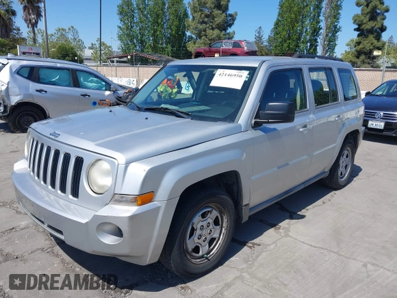 2010 Jeep Patriot Sport with VIN 1J4NT2GBXAD660180, listed as a IAAI auction lot 42146950 with 217,054 mi miles. Bid and sale history available at carsss.com. Image 6.