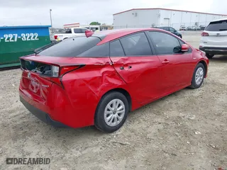 2021 Toyota Prius L Eco with VIN JTDKAMFU6M3134586, listed as a IAAI auction lot 41909538 with 55,355 mi miles. Bid and sale history available at carsss.com. Image 4.