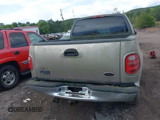 2003 Ford F-150 XLT with VIN 1FTRW08L63KD06455, listed as a IAAI auction lot 41988549 with 138,168 mi miles. Bid and sale history available at carsss.com. Image 16.