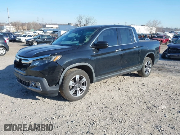 2019 Honda Ridgeline RTL-E with VIN 5FPYK3F7XKB033652, listed as a IAAI auction lot 41751421 with 96,774 mi miles and . Bid and sale history available at DreamBid. Image 2.