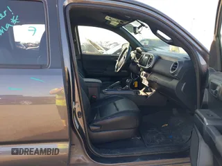 2017 Toyota Tacoma SR5 with VIN 5TFCZ5AN5HX077315, listed as a IAAI auction lot 42017639 with 74,999 mi miles and . Bid and sale history available at DreamBid. Image 5.
