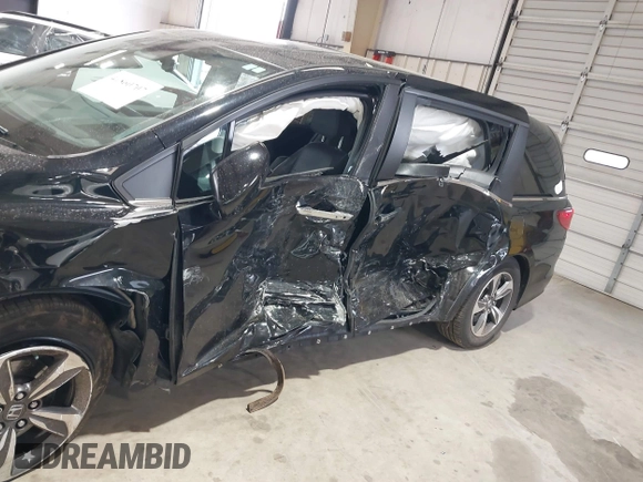 2018 Honda Odyssey Touring with VIN 5FNRL6H87JB105410, listed as a IAAI auction lot 41860707 with 91,908 mi miles. Bid and sale history available at carsss.com. Image 6.