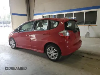 2009 Honda Fit Sport with VIN JHMGE884X9C001544, listed as a Copart auction lot 51390295 with 169,432 mi miles and Salvage Title. Bid and sale history available at carsss.com. Image 2.