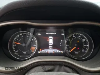 2015 Jeep Cherokee Trailhawk with VIN 1C4PJMBB6FW574108, listed as a Copart auction lot 57798475 with 105,022 mi miles and Salvage title. Bid and sale history available at DreamBid. Image 9.