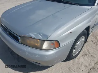 1996 Subaru Legacy L with VIN 4S3BK4352T6318494, listed as a IAAI auction lot 42162704 with 272,055 mi miles and . Bid and sale history available at DreamBid. Image 6.
