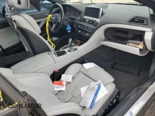 2015 BMW M6 z VIN WBSLZ9C59FD651474, wystawiony jako Copart lot #60882454 z przebiegiem Nie podano mil oraz Szkody całkowita. Historia ofert i sprzedaży dostępna na DreamBid. Obrazek 8.