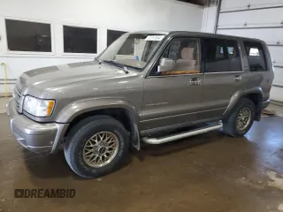 2000 Isuzu Trooper S with VIN JACDJ58X0Y7J10724, listed as a Copart auction lot 72787804 with 157,618 mi miles and Salvage Title. Bid and sale history available at DreamBid. Image 1.