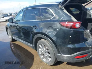 2020 Mazda CX-9 Grand Touring with VIN JM3TCBDY2L0413839, listed as a IAAI auction lot 41720713 with 48,964 mi miles and . Bid and sale history available at DreamBid. Image 15.