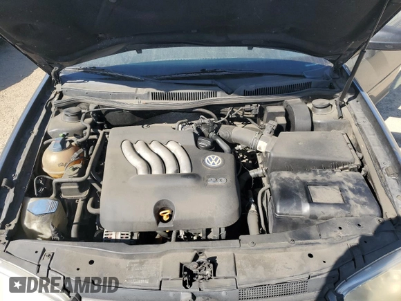 2000 Volkswagen Golf z VIN 9BWGC21J1Y4015285, wystawiony jako Copart lot #52346445 z przebiegiem 256 794 mil mil oraz Czysty tytuł • Clean title. Historia ofert i sprzedaży dostępna na DreamBid. Obrazek 11.