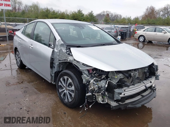 2021 Toyota Prius LE with VIN JTDKAMFP9M3170928, listed as a IAAI auction lot 42123934 with 58,293 mi miles and . Bid and sale history available at DreamBid. Image 6.