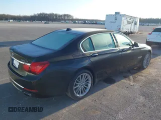 2013 BMW 7 Series 750Li xDrive with VIN WBAYF8C53DD140448, listed as a IAAI auction lot 41933840 with 119,013 mi miles. Bid and sale history available at carsss.com. Image 4.