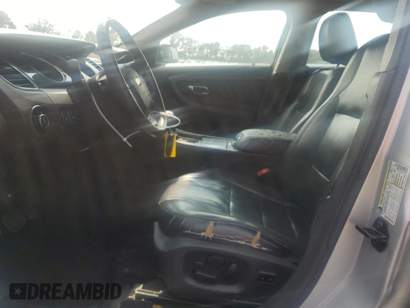 2010 Ford Taurus Limited with VIN 1FAHP2FWXAG149570, listed as a Copart auction lot 59150085 with 201,632 mi miles and Salvage title. Bid and sale history available at DreamBid. Image 7.