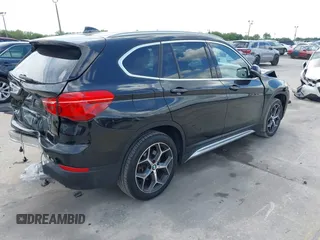 2019 BMW X1 sDrive28i with VIN WBXHU7C56K5L10962, listed as a IAAI auction lot 41904580 with 37,213 mi miles. Bid and sale history available at carsss.com. Image 4.