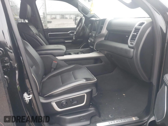2021 Ram 1500 Laramie with VIN 1C6SRFJT6MN580803, listed as a IAAI auction lot 41207914 with 56,891 mi miles and . Bid and sale history available at DreamBid. Image 5.