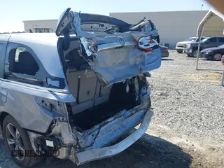 2018 Honda Odyssey Touring with VIN 5FNRL6H84JB070387, listed as a IAAI auction lot 41835852 with 98,662 mi miles. Bid and sale history available at carsss.com. Image 6.