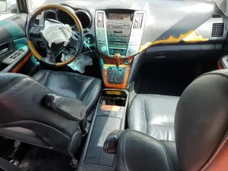 2004 Lexus RX 330 z VIN 2T2GA31U54C008228, wystawiony jako Copart lot #54125085 z przebiegiem 294 297 mil mil oraz Szkoda całkowita • Salvage title. Historia ofert i sprzedaży dostępna na DreamBid. Obrazek 8.