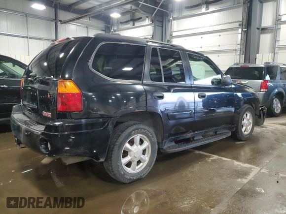 2004 GMC Envoy SLT with VIN 1GKDT13S642191868, listed as a Copart auction lot 82334304 with 150,810 mi miles and Salvage Title. Bid and sale history available at carsss.com. Image 3.