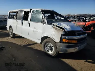 2005 Chevrolet Express Passenger with VIN 1GAHG39U851234497, listed as a Copart auction lot 77631364 with 173,891 mi miles and Salvage title. Bid and sale history available at DreamBid. Image 4.