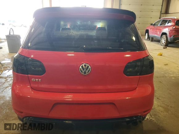 2010 Volkswagen Golf GTI z VIN WVWEV7AJ3AW392395, wystawiony jako Copart lot #50179475 z przebiegiem 124 420 mil mil oraz Szkoda całkowita • Salvage title. Historia ofert i sprzedaży dostępna na DreamBid. Obrazek 6.