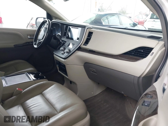 2015 Toyota Sienna XLE with VIN 5TDYK3DC5FS640102, listed as a IAAI auction lot 41885194 with 119,972 mi miles. Bid and sale history available at carsss.com. Image 5.