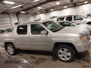 2009 Honda Ridgeline RTL with VIN 2HJYK16519H000129, listed as a IAAI auction lot 41891810 with 186,124 mi miles. Bid and sale history available at carsss.com. Image 13.