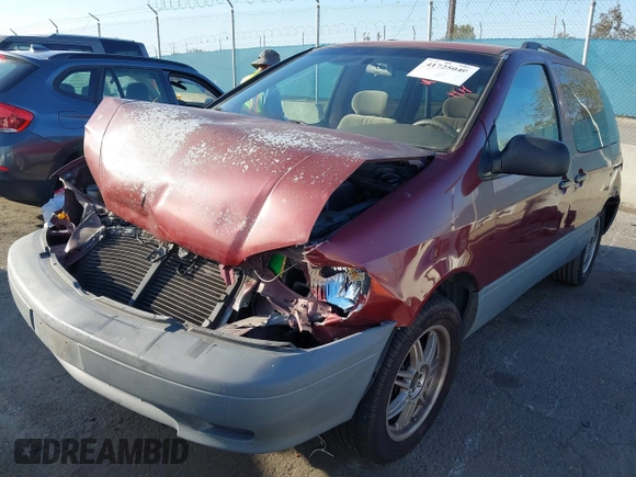 2002 Toyota Sienna CE with VIN 4T3ZF19C12U438162, listed as a IAAI auction lot 41725040 with 241,080 mi miles. Bid and sale history available at carsss.com. Image 2.