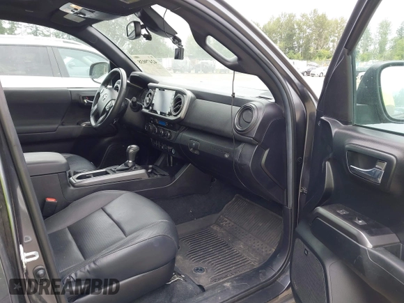 2021 Toyota Tacoma SR5 with VIN 3TMDZ5BN1MM119711, listed as a IAAI auction lot 42479038 with 64,779 mi miles and . Bid and sale history available at DreamBid. Image 5.