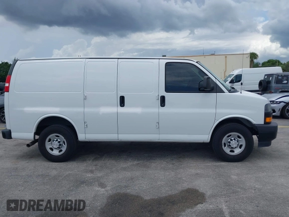 2018 Chevrolet Express Cargo with VIN 1GCWGAFP0J1342902, listed as a IAAI auction lot 42568676 with 98,489 mi miles and . Bid and sale history available at DreamBid. Image 13.