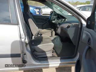 2003 Ford Focus LX with VIN 1FAFP33P83W239710, listed as a IAAI auction lot 42035643 with 178,016 mi miles and . Bid and sale history available at carsss.com. Image 5.