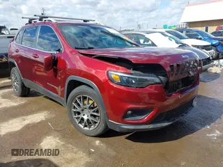 2020 Jeep Cherokee Altitude with VIN 1C4PJLLB3LD615567, listed as a IAAI auction lot 41716186 with 192,523 mi miles and . Bid and sale history available at carsss.com. Image 1.
