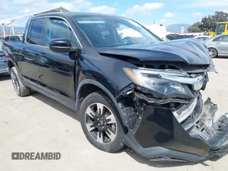 2020 Honda Ridgeline RTL with VIN 5FPYK3F53LB030107, listed as a IAAI auction lot 41933517 with 93,373 mi miles and . Bid and sale history available at DreamBid. Image 1.