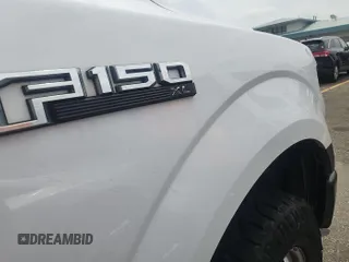 2017 Ford F-150 XL with VIN 1FTEX1E82HKD27618, listed as a IAAI auction lot 42796140 with 124,457 mi miles and . Bid and sale history available at DreamBid. Image 13.