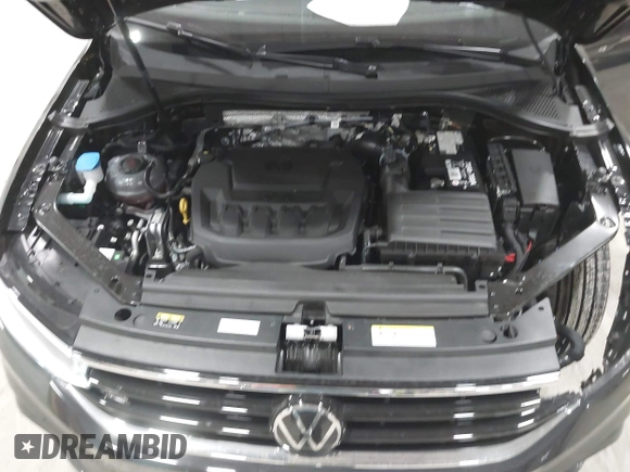 2024 Volkswagen Tiguan SE R-Line Black with VIN 3VV8B7AX8RM103700, listed as a IAAI auction lot 41991238 with 5,084 mi miles and . Bid and sale history available at DreamBid. Image 10.