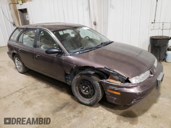 1998 Saturn SW z VIN 1G8ZK8271WZ165967, wystawiony jako Copart lot #73493044 z przebiegiem Nie podano mil oraz Szkoda całkowita • Salvage title. Historia ofert i sprzedaży dostępna na DreamBid. Obrazek 4.