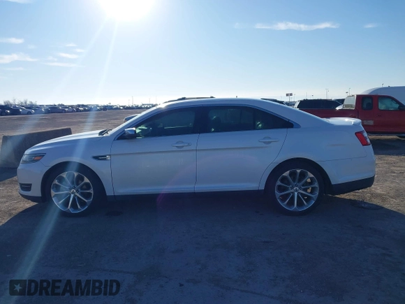 2015 Ford Taurus Limited с VIN 1FAHP2F85FG169704, выставлен на аукционе IAAI как лот 41152599 с пробегом 167 589 миль миль и . История ставок и продаж доступна на DreamBid. Изображение 14.
