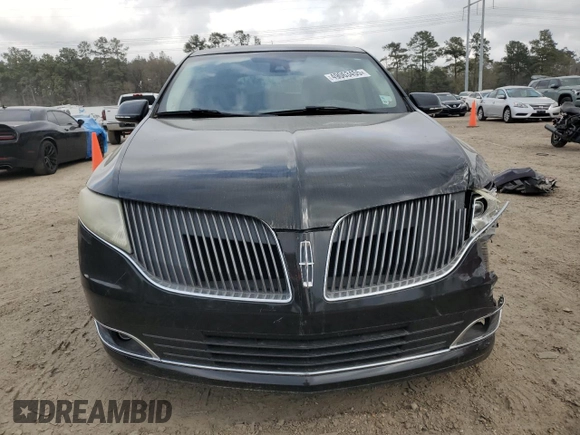 2014 Lincoln MKT with VIN 2LMHJ5FKXEBL53440, listed as a Copart auction lot 49063455 with 207,928 mi miles and Salvage Title. Bid and sale history available at DreamBid. Image 5.