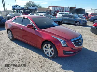 2015 Cadillac ATS Standard RWD with VIN 1G6AA5RX5F0108382, listed as a IAAI auction lot 41639226 with 81,894 mi miles and . Bid and sale history available at DreamBid. Image 1.