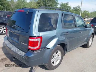 2011 Ford Escape Hybrid z VIN 1FMCU5K37BKB86287, wystawiony jako IAAI lot #42683149 z przebiegiem 151 972 mil mil oraz . Historia ofert i sprzedaży dostępna na DreamBid. Obrazek 6.