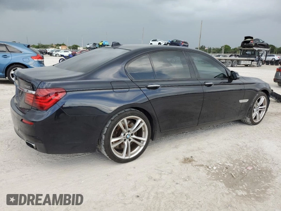 2013 BMW 7 Series 750i with VIN WBAYA8C56DC996704, listed as a Copart auction lot 64466705 with 102,278 mi miles and Salvage title. Bid and sale history available at DreamBid. Image 3.