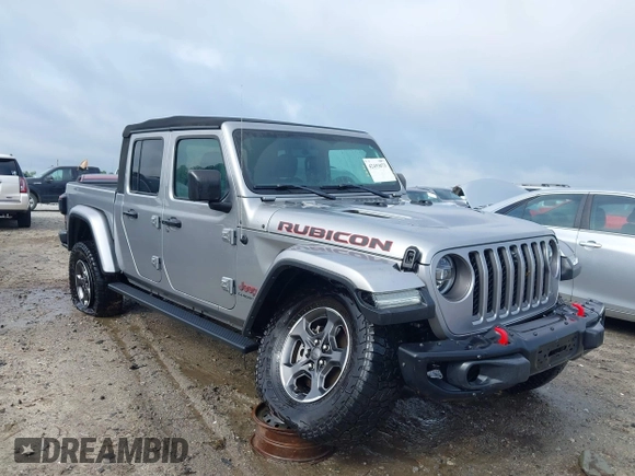2020 Jeep Gladiator Rubicon z VIN 1C6JJTBG7LL181833, wystawiony jako IAAI lot #42493073 z przebiegiem 13 775 mil mil oraz . Historia ofert i sprzedaży dostępna na DreamBid. Obrazek 1.