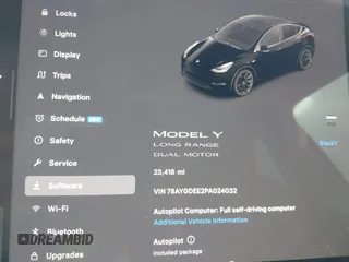 2023 Tesla Model Y Long Range with VIN 7SAYGDEE2PA024032, listed as a IAAI auction lot 41213403 with 23,418 mi miles and . Bid and sale history available at DreamBid. Image 7.