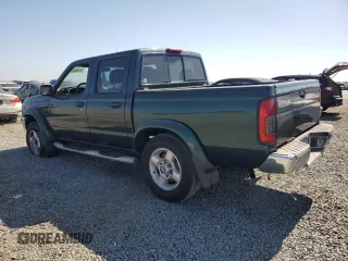 2000 Nissan Frontier XE with VIN 1N6ED27T0YC364061, listed as a Copart auction lot 61863515 with 226,867 mi miles and Clean title. Bid and sale history available at DreamBid. Image 2.