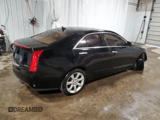 2013 Cadillac ATS z VIN 1G6AG5RXXD0157086, wystawiony jako Copart lot #53612655 z przebiegiem 124 141 mil mil oraz Szkoda całkowita • Salvage title. Historia ofert i sprzedaży dostępna na DreamBid. Obrazek 3.
