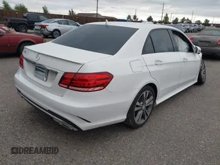 2014 Mercedes-Benz E 350 Sport with VIN WDDHF5KBXEA851680, listed as a IAAI auction lot 42420395 with 106,644 mi miles and . Bid and sale history available at DreamBid. Image 4.