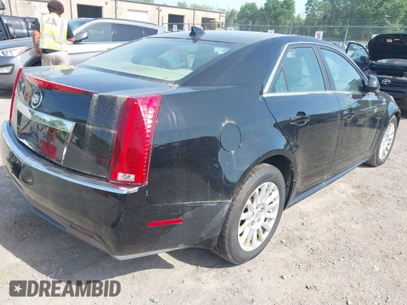 2012 Cadillac CTS Luxury z VIN 1G6DG5E58C0134874, wystawiony jako IAAI lot #42564120 z przebiegiem 121 053 mil mil oraz . Historia ofert i sprzedaży dostępna na DreamBid. Obrazek 4.