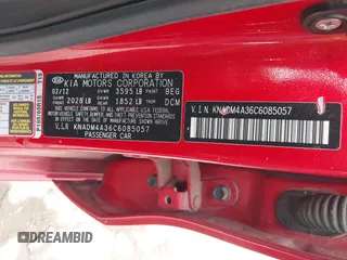 2012 Kia Rio LX with VIN KNADM4A36C6085057, listed as a IAAI auction lot 42111921 with 136,217 mi miles. Bid and sale history available at carsss.com. Image 9.