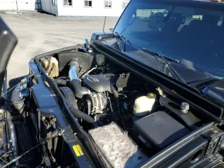 2005 Hummer H2 SUT with VIN 5GRGN22U55H112442, listed as a Copart auction lot 86158414 with 135,411 mi miles and Salvage Title. Bid and sale history available at carsss.com. Image 12.